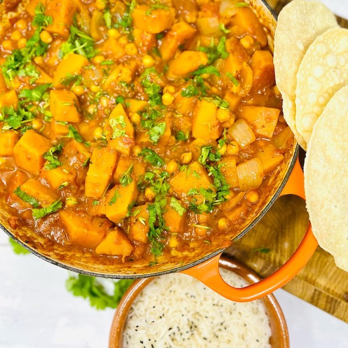 butternut squash curry served with boiled rice and popadoms